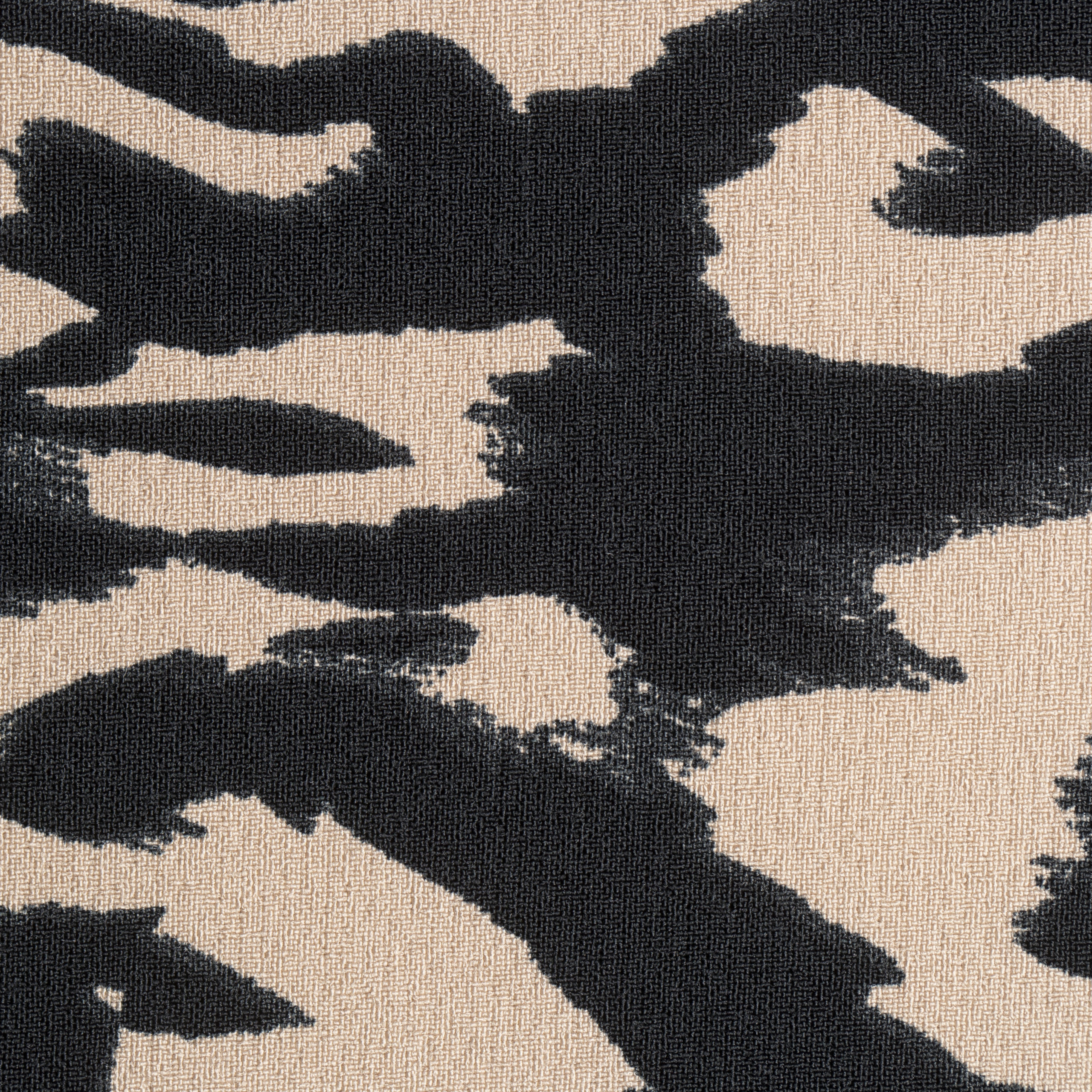 Tissu imprimé motifs noirs et beige Tissu imprimé motifs noirs et beige